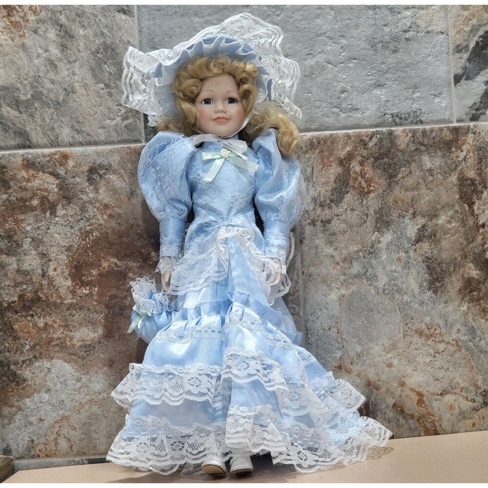 Porcelain Doll Blond Hair Blue Eyes Blue Dress Lace Trim Matching Hat Bag 19"